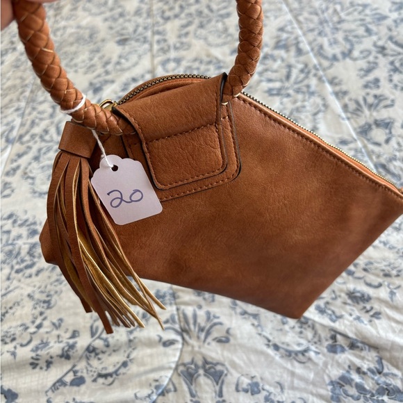 Tan leather Clutch with Braided Handle and Tassel - Picture 1 of 4